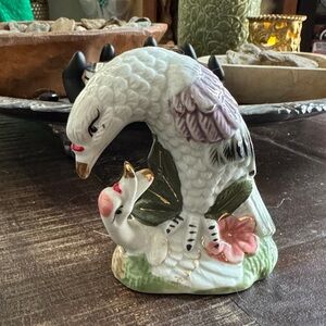 Very passionate vintage porcelain Bird Figurine